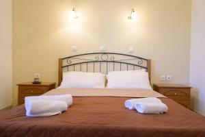 Postel nebo postele na pokoji v ubytování Villa Avra
