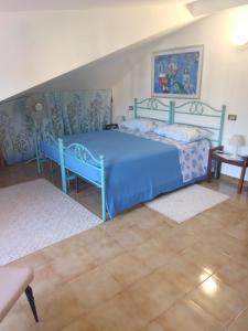 Posteľ alebo postele v izbe v ubytovaní Villa Cavaliere