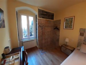 Postel nebo postele na pokoji v ubytování 5 TERRE PELAGOS 2