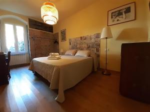 Postel nebo postele na pokoji v ubytování 5 TERRE PELAGOS 2