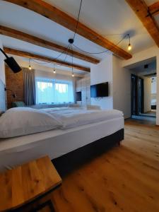 Postel nebo postele na pokoji v ubytování Apartmány Resort Na Horské