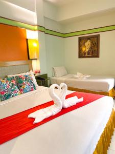 מיטה או מיטות בחדר ב-Polkadot Hostel