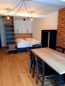 Postel nebo postele na pokoji v ubytování Apartmány Resort Na Horské