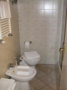Koupelna v ubytování Albergo Cannon d'Oro