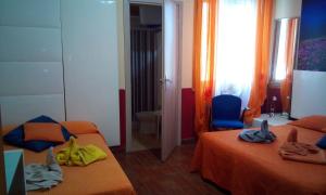 Posteľ alebo postele v izbe v ubytovaní Villa Morgante B&B