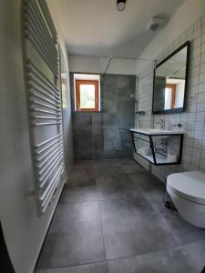 Koupelna v ubytování Apartmány Resort Na Horské