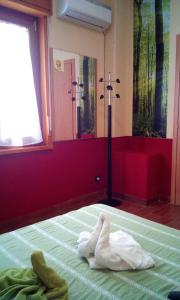 Posteľ alebo postele v izbe v ubytovaní Villa Morgante B&B