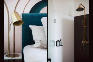 Postel nebo postele na pokoji v ubytování MUZE Hotel Utrecht