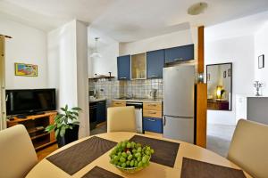Kuchyň nebo kuchyňský kout v ubytování Apartment Nikola