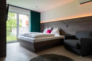 Ένα ή περισσότερα κρεβάτια σε δωμάτιο στο Freiraum 9 Living Apartment