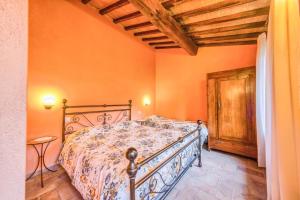 Letto o letti in una camera di Borgo Struginati