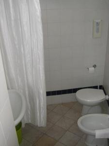 Koupelna v ubytování Albergo Cannon d'Oro