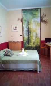 Posteľ alebo postele v izbe v ubytovaní Villa Morgante B&B