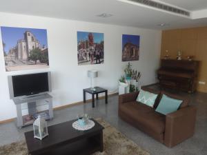 TV a/nebo společenská místnost v ubytování Hotel Bonjardim