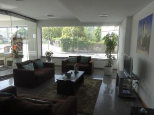 Posezení v ubytování Hotel Bonjardim