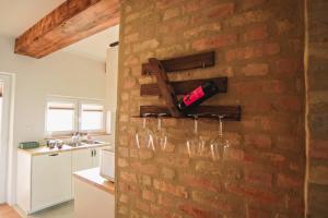 A kitchen or kitchenette at Art Gallery Apartment