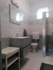 Ванна кімната в Apátságúti Vendégház