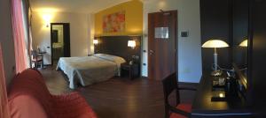 Postel nebo postele na pokoji v ubytování Hotel Villa Rosa