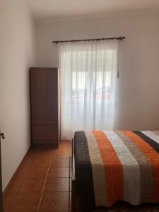 Krevet ili kreveti u jedinici u objektu Apartamento T2