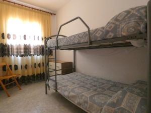 Postel nebo postele na pokoji v ubytování Rentalmar Chalet Dalias + 10 fotografií
