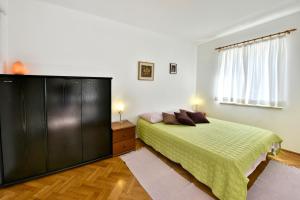 Postel nebo postele na pokoji v ubytování Apartment Nikola