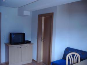 A television and/or entertainment centre at Haus Gartenheim