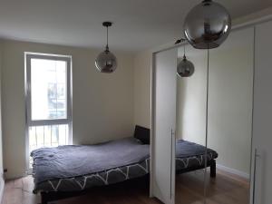 Posteľ alebo postele v izbe v ubytovaní Sanshiro apartment