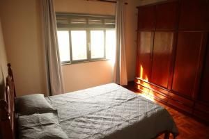 Ένα ή περισσότερα κρεβάτια σε δωμάτιο στο Casa/sítio na serra em Bom Jardim - RJ