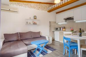 Kuchyň nebo kuchyňský kout v ubytování Apartments Kaštel