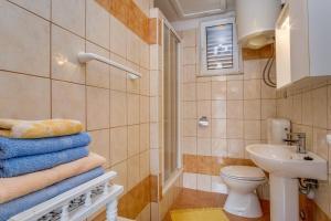 Koupelna v ubytování Apartments Kaštel