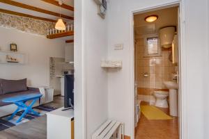 Koupelna v ubytování Apartments Kaštel