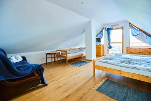 Posteľ alebo postele v izbe v ubytovaní Kilátás a tóra Apartman