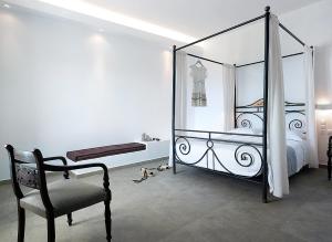 Ein Bett oder Betten in einem Zimmer der Unterkunft Santa Maria Luxury Suites & Spa