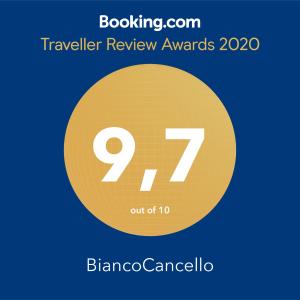 a yellow circle with the text travel review awards at BiancoCancello in Sacrofano