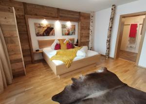 Postel nebo postele na pokoji v ubytování BERGHEIL Apartments