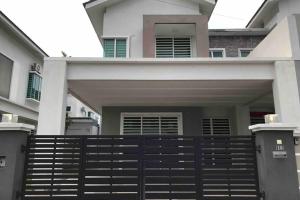 a house with a black gate in front of it at be.Animania -8-10mins Lost World Tambun -14-18pax in Ipoh