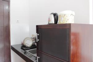 Dapur atau dapur kecil di Simply Homey Studio at Gateway Pasteur Apartment near Exit Toll By Travelio