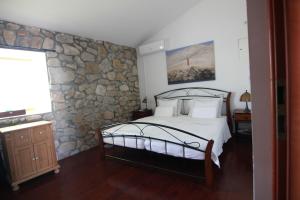 Posteľ alebo postele v izbe v ubytovaní Villa Calma, recharge your body and mind