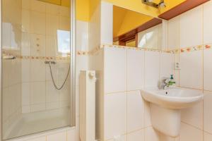 Ein Badezimmer in der Unterkunft VS apartmán