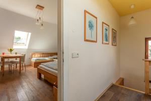 Ein Bett oder Betten in einem Zimmer der Unterkunft VS apartmán
