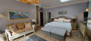 Ένα ή περισσότερα κρεβάτια σε δωμάτιο στο Roosboom Guest Apartments +30 φωτογραφίες