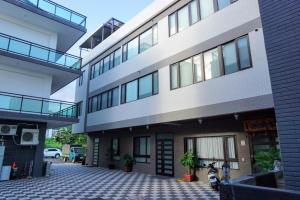 a view of the outside of a building at Autumn Fountain Homestay in Jiaoxi