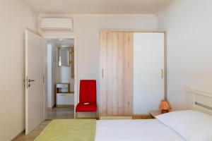 Cama ou camas em um quarto em Apartment Pod Nespolom