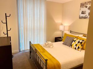 Ένα ή περισσότερα κρεβάτια σε δωμάτιο στο Smartrips Apartments - The Hub