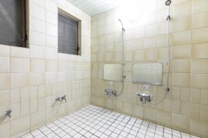 Koupelna v ubytování Tabist Futaba Ryokan Tatsuno