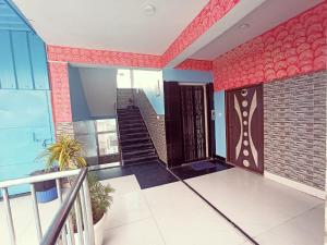 Hotel Anand LOK客房内的一张或多张床位