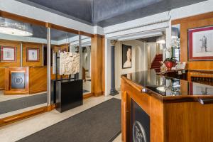 a room with a counter and a display case at Hotel S. Anna in Rome