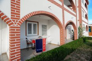 Fotografie z fotogalerie ubytování Apartmani Vila Caska v Novalji