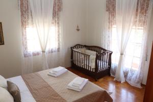 Postel nebo postele na pokoji v ubytování Meteoron Guesthouse