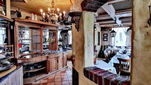 a restaurant with a bar and a dining room at Hotel-Restaurant Feldkamp in Rosendahl +18 photos